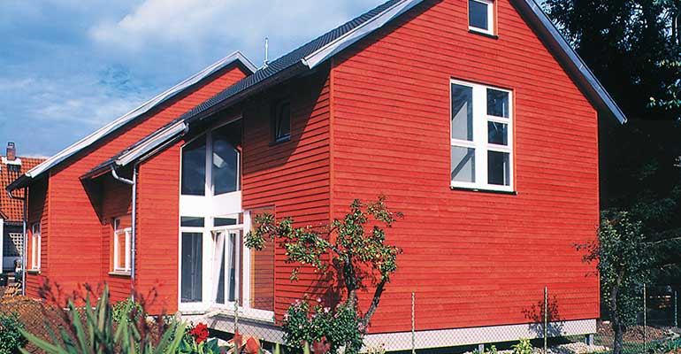 Haus aus Holz Malerarbeiten